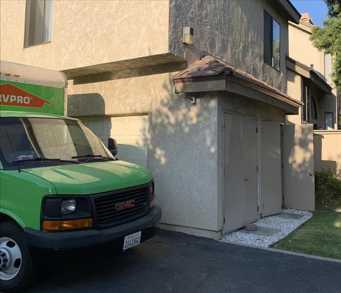 SERVPRO truck parked in front of residential job site